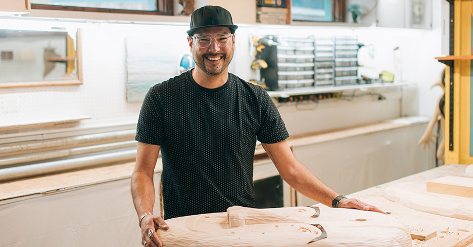 A man working on a project with wood 