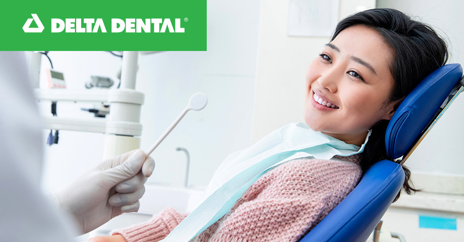 A women getting her 6 months check up at the dentist 