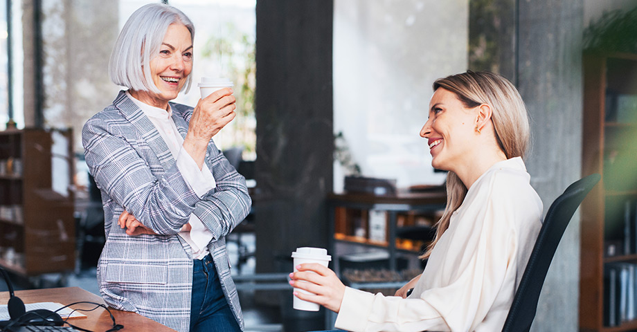 Employee talking together at work