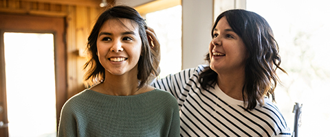 Two women smiling