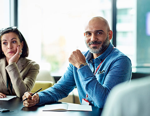 A man and women looking at plan options 