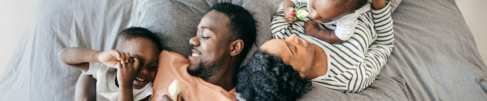 Texas family on bed banner