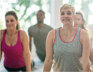 A group of people doing a yoga workout together