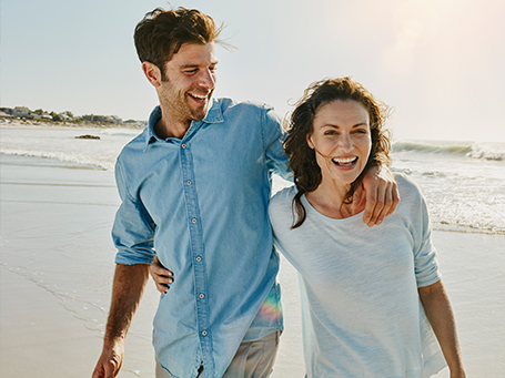 Couple walking on beach