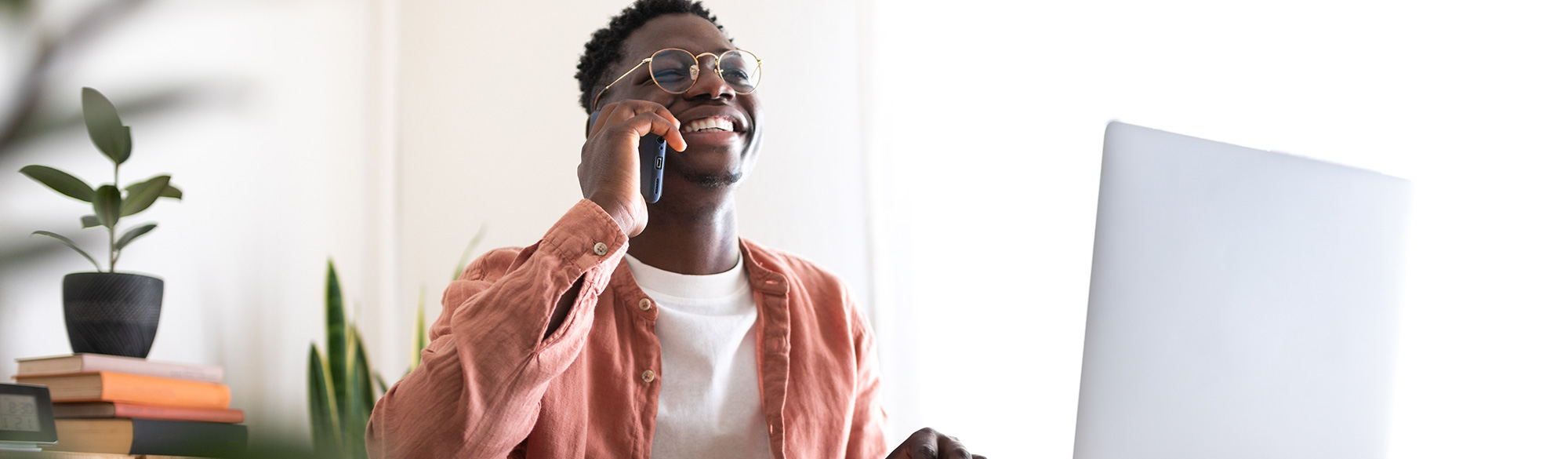 A customer service person helping someone on the phone